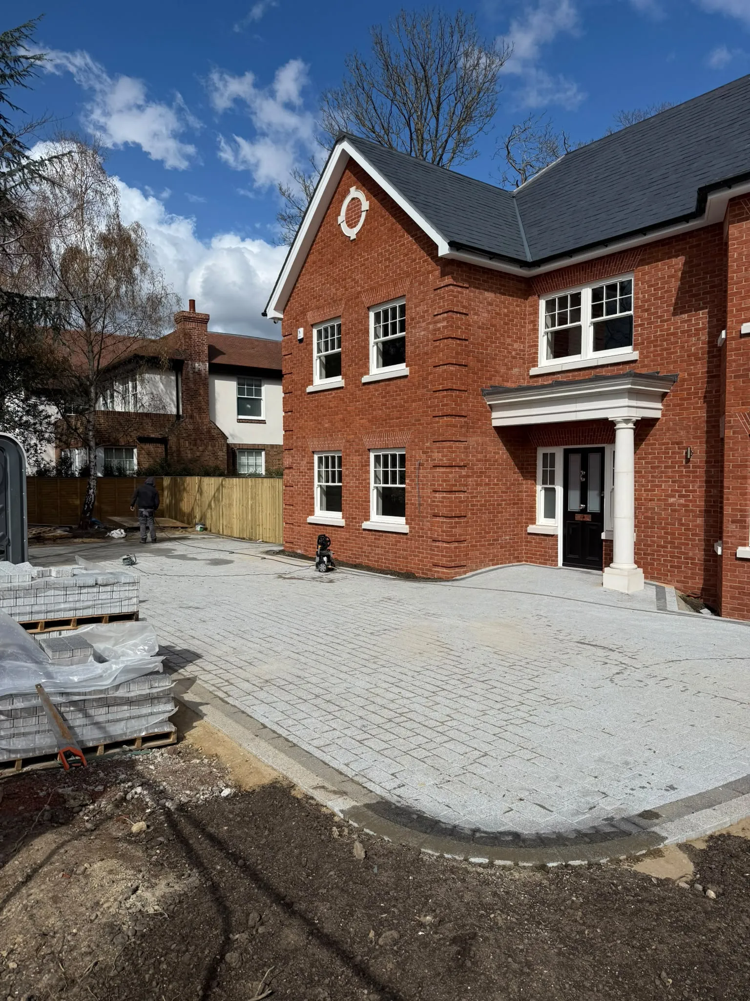 Granite sett block paving driveway being installed by Prestige Landscapes