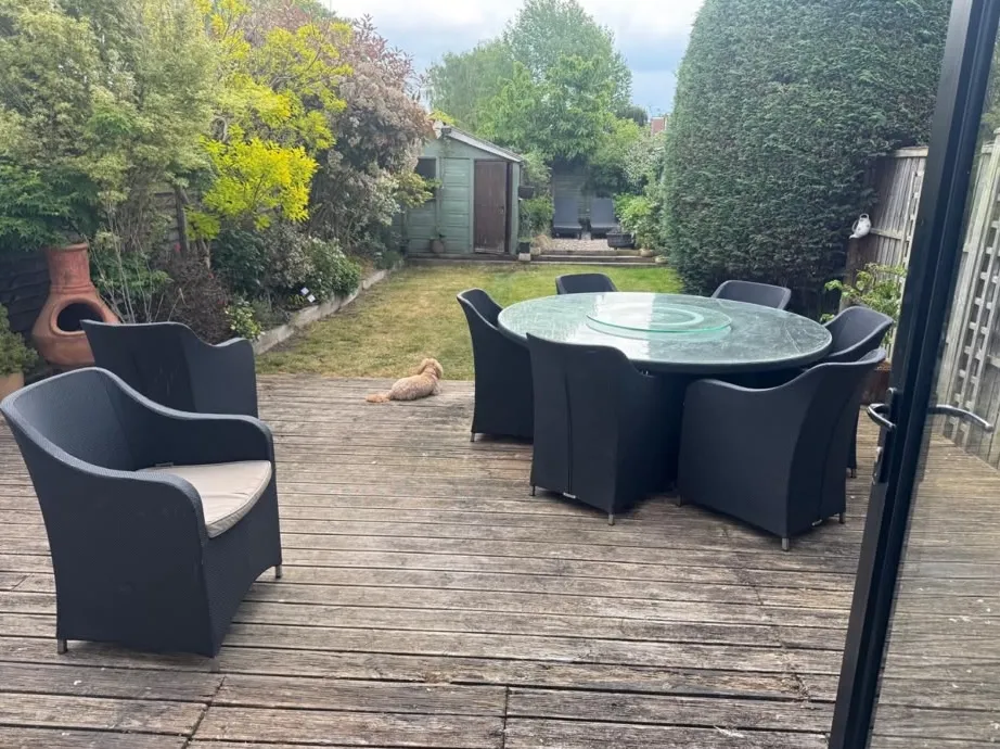 Tired timber deck and lawn before a Beckenham garden refurbishment