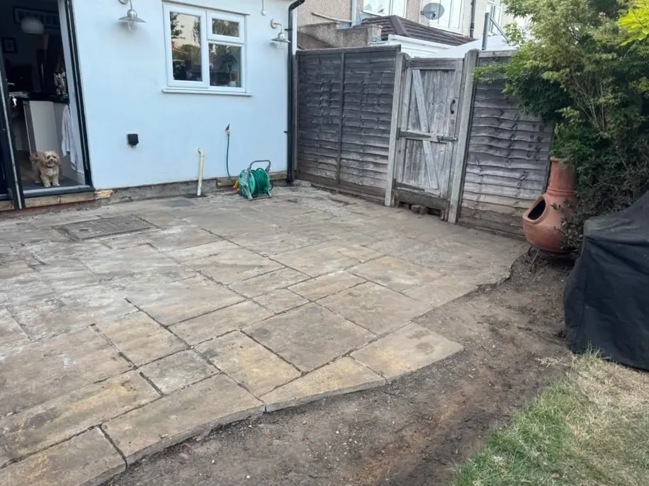 Old riven patio by the house before replacement in a Beckenham garden
